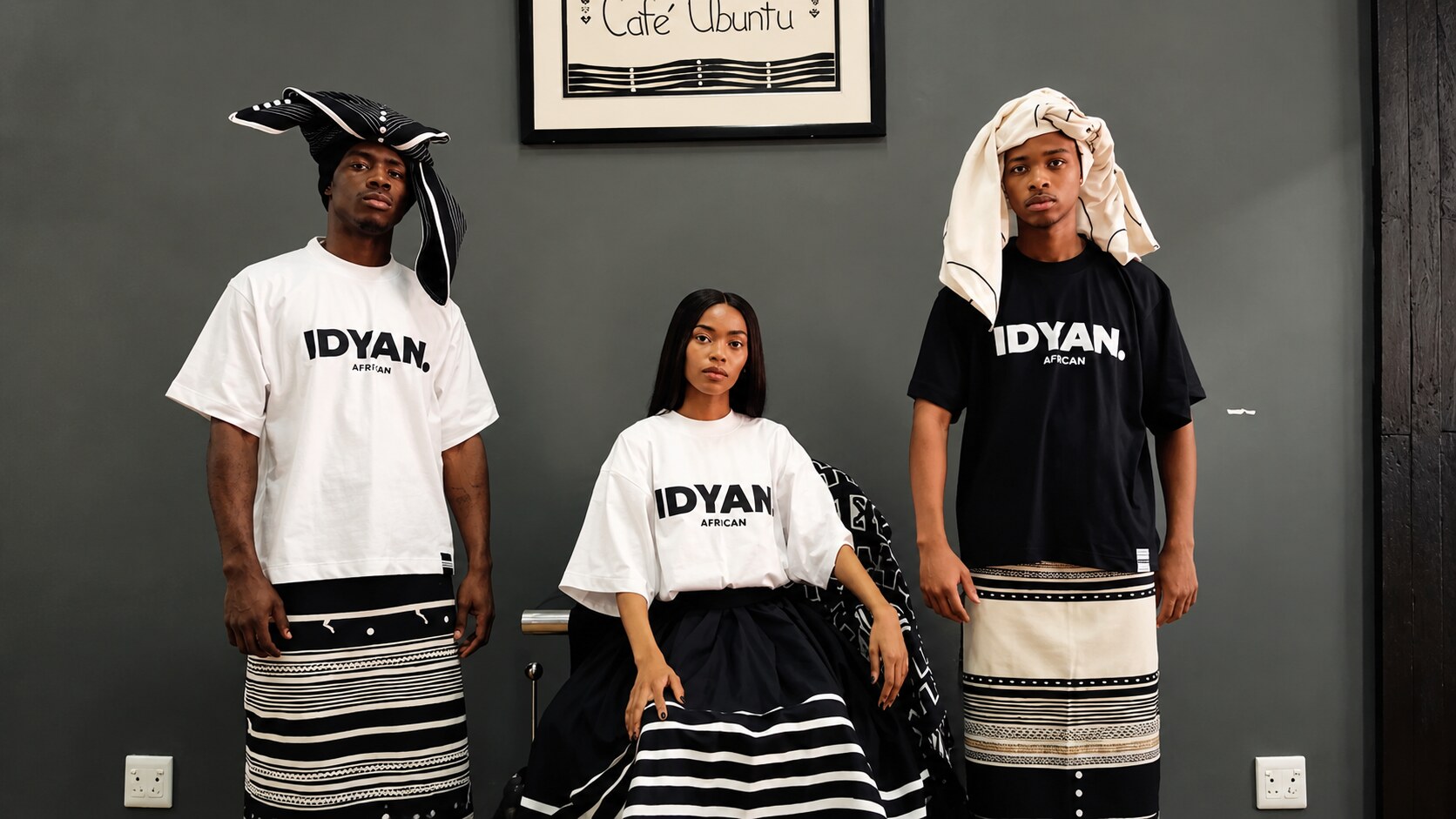 IDYAN community in tees and traditional skirts