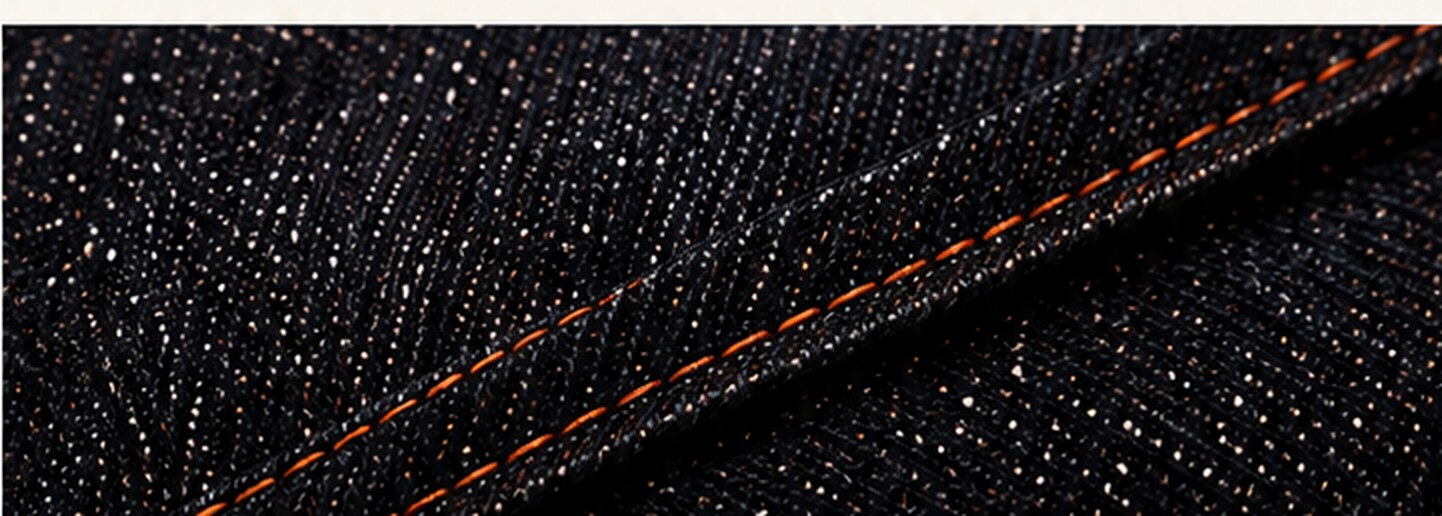 Raw denim with copper contrast stitching